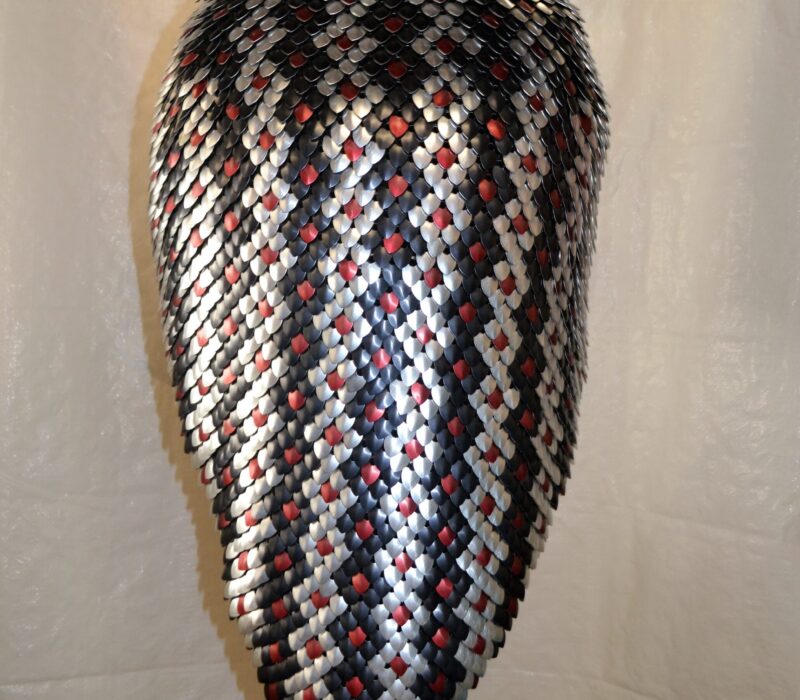 Back view of a reptile-pattern scalemaille skirt